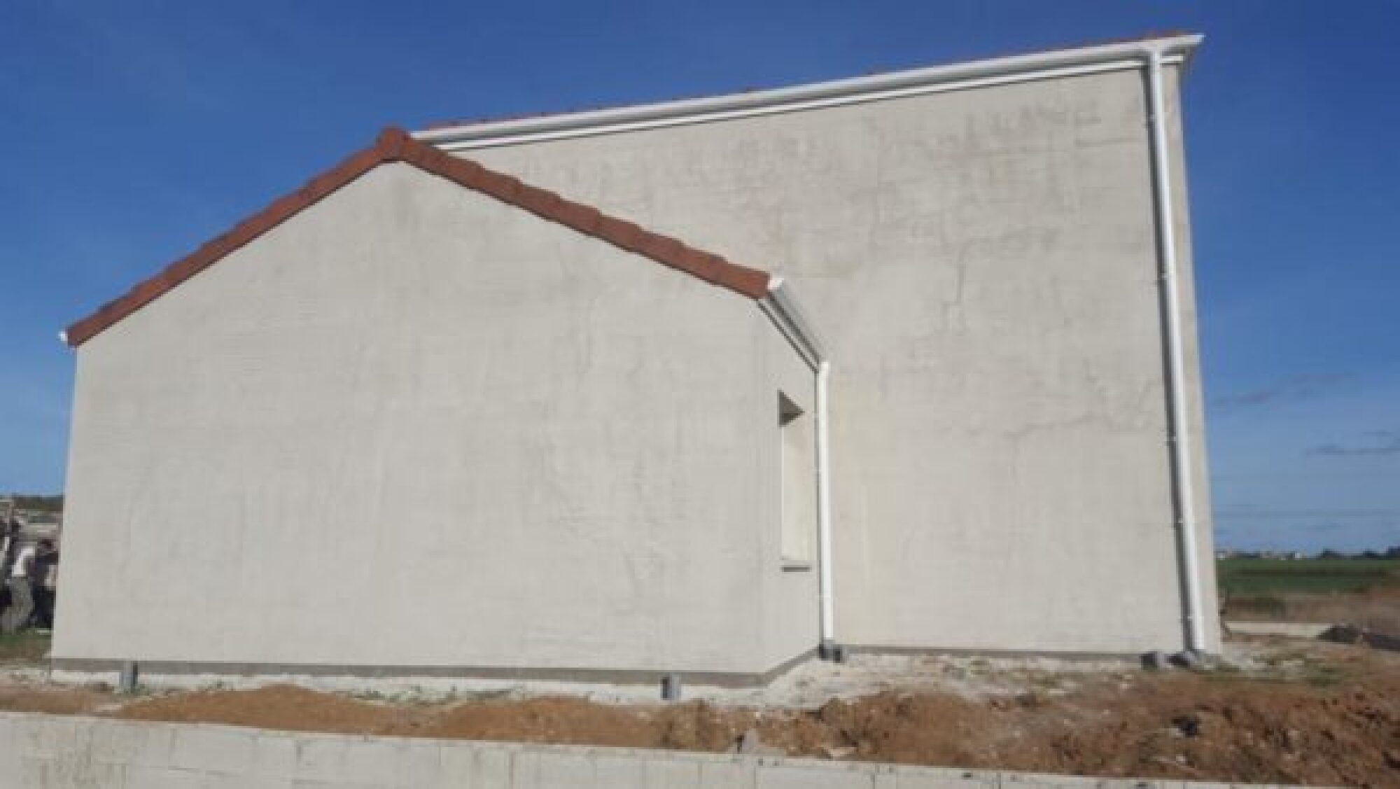 Installation enduit provisoire façade maison à Sanry sur Nied