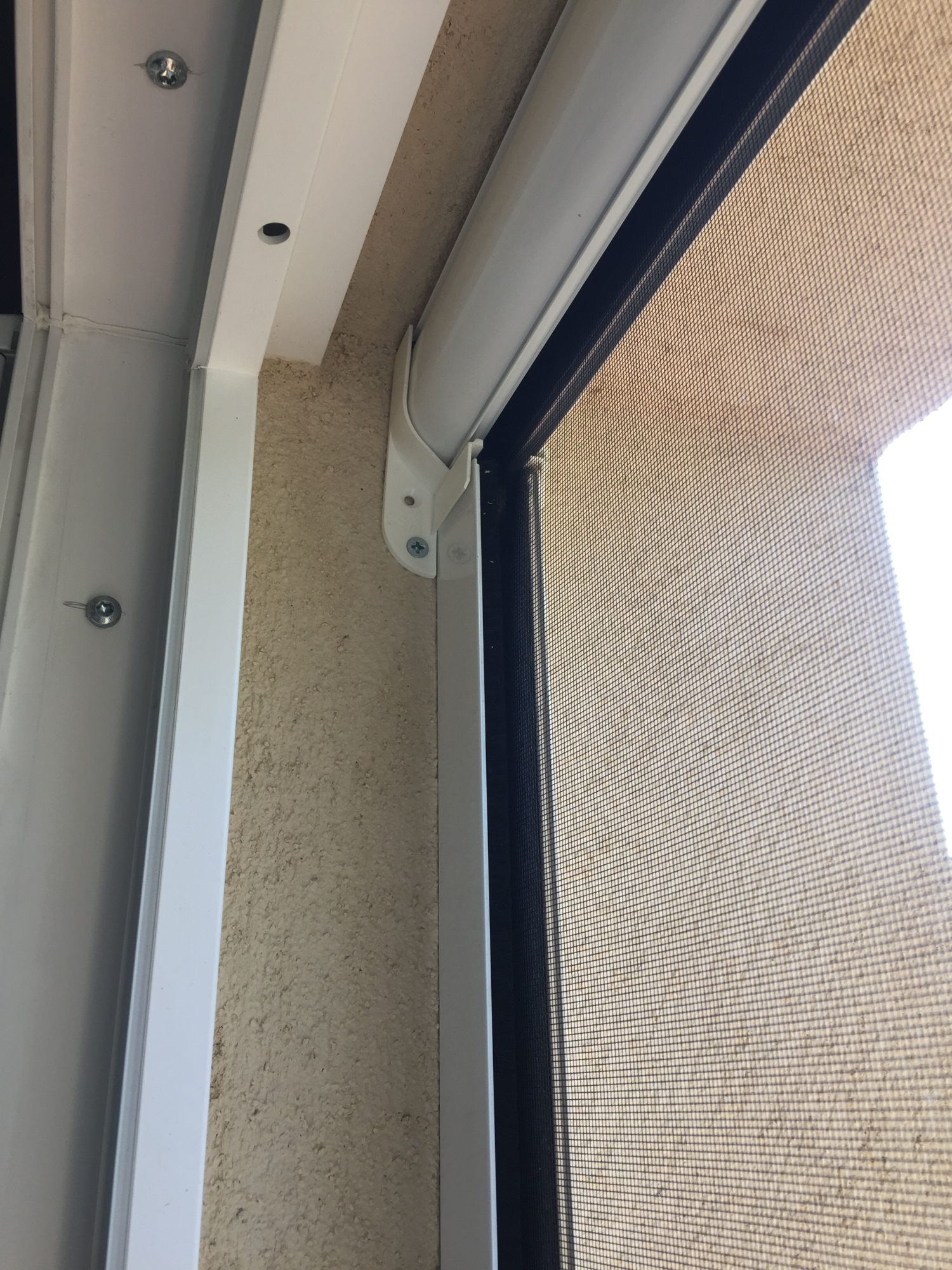 Moustiquaire enroulable verticale