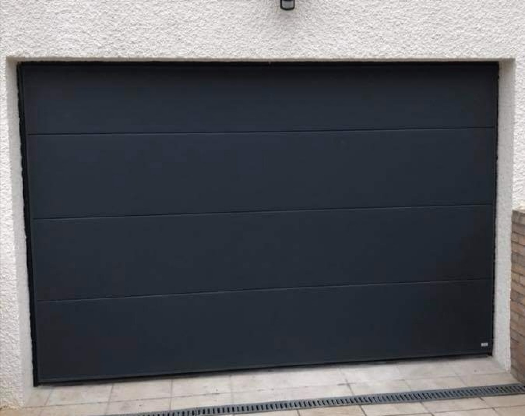 Porte de garage sectionnelle