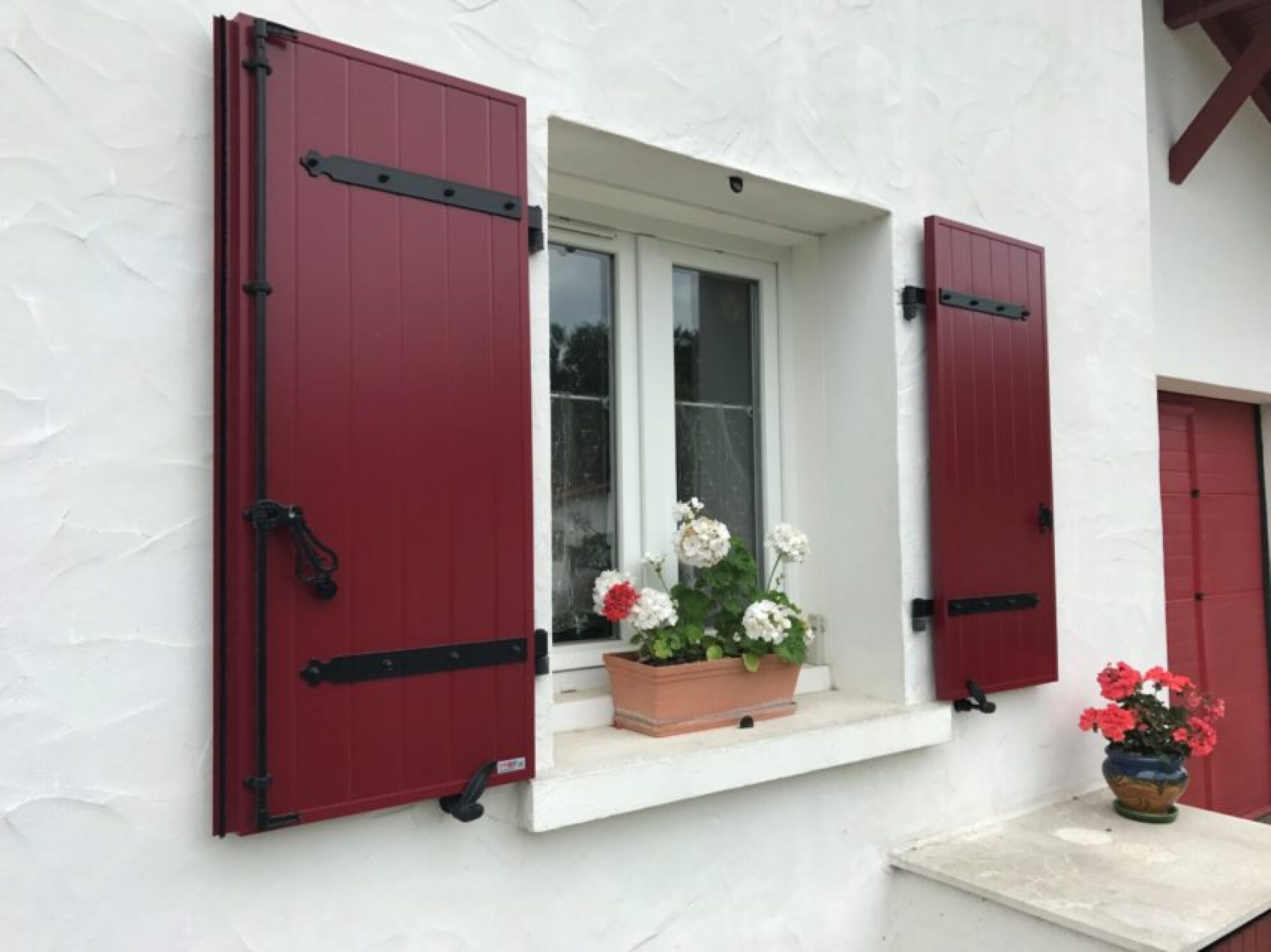 Pose de volets battants aluminium ou bois