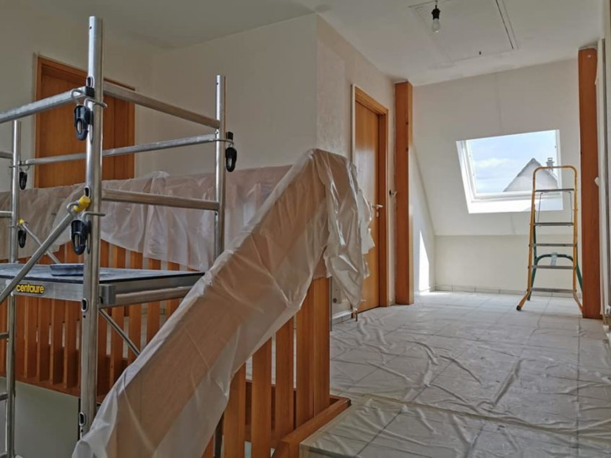 Application peinture en maison neuve