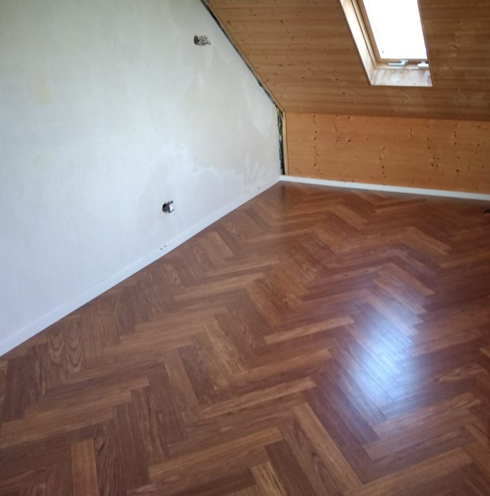Pose de parquet en bois massif