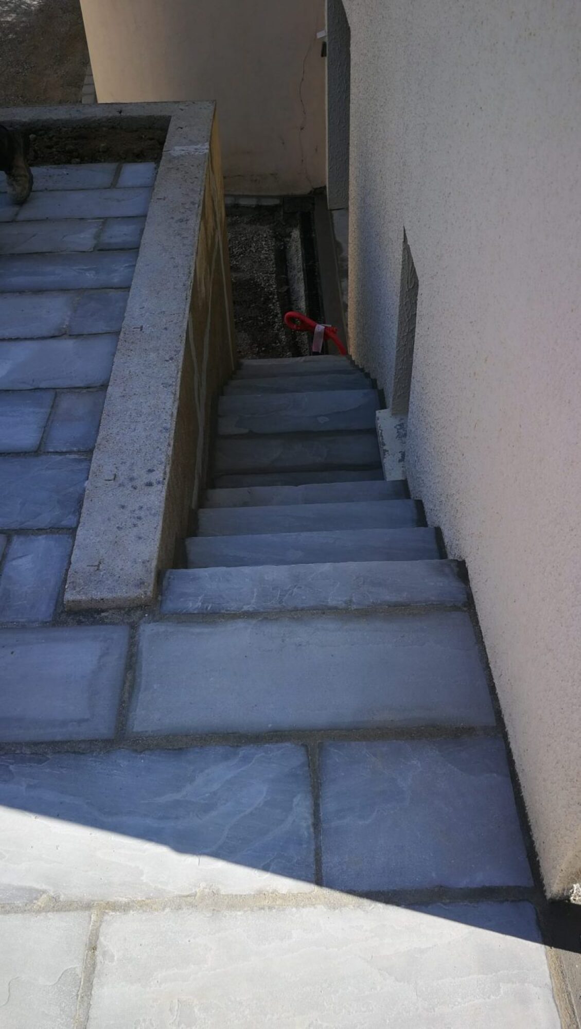 Réalisation de terrasse en béton avec revêtement