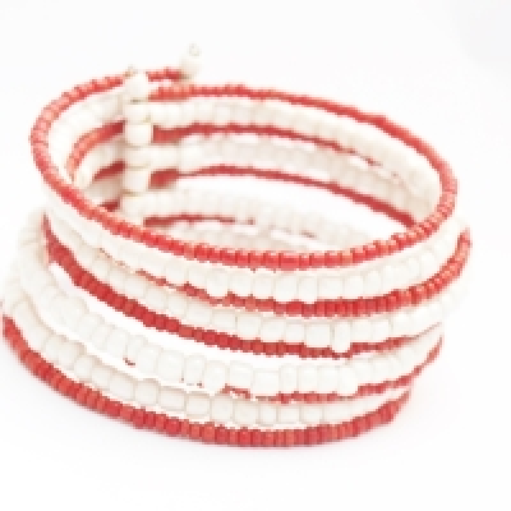 Bracelet rigide en perles oranges et blanches