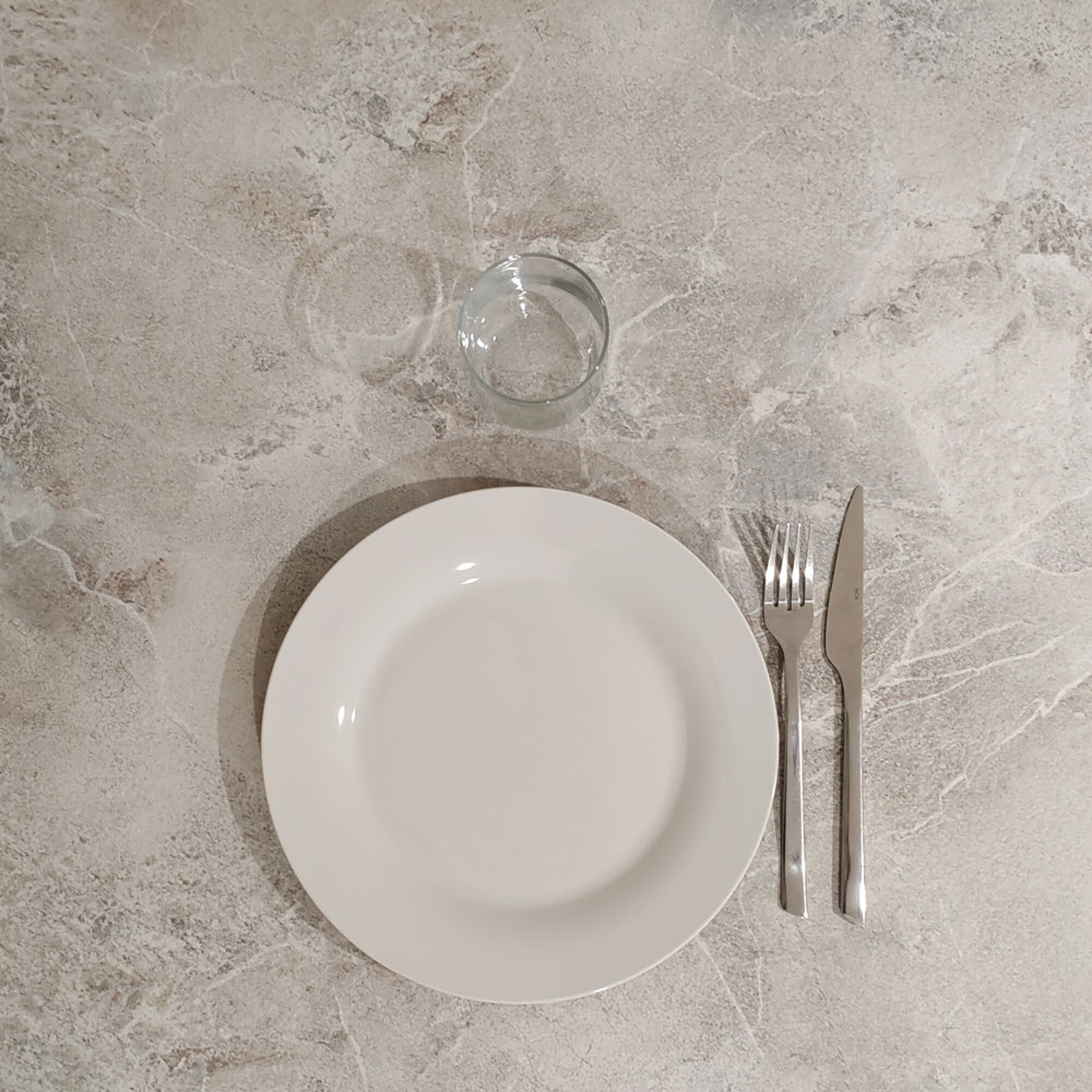 Table pliable pour terrasse en Compact HPL décor gris pierre 70x70