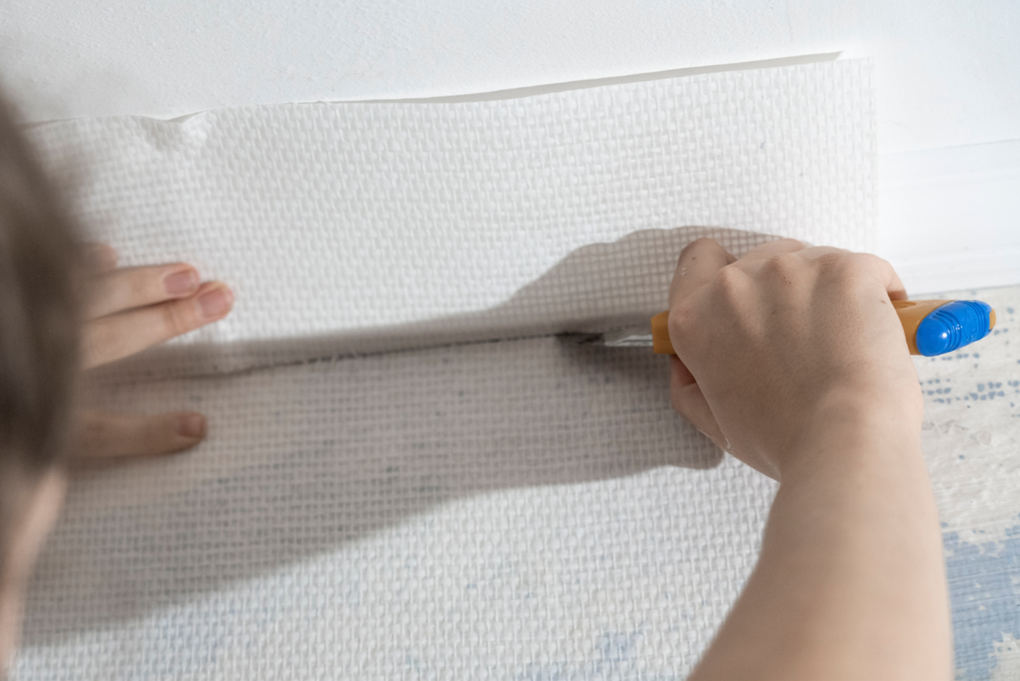 Remplacement de sections de toile de verre abîmées