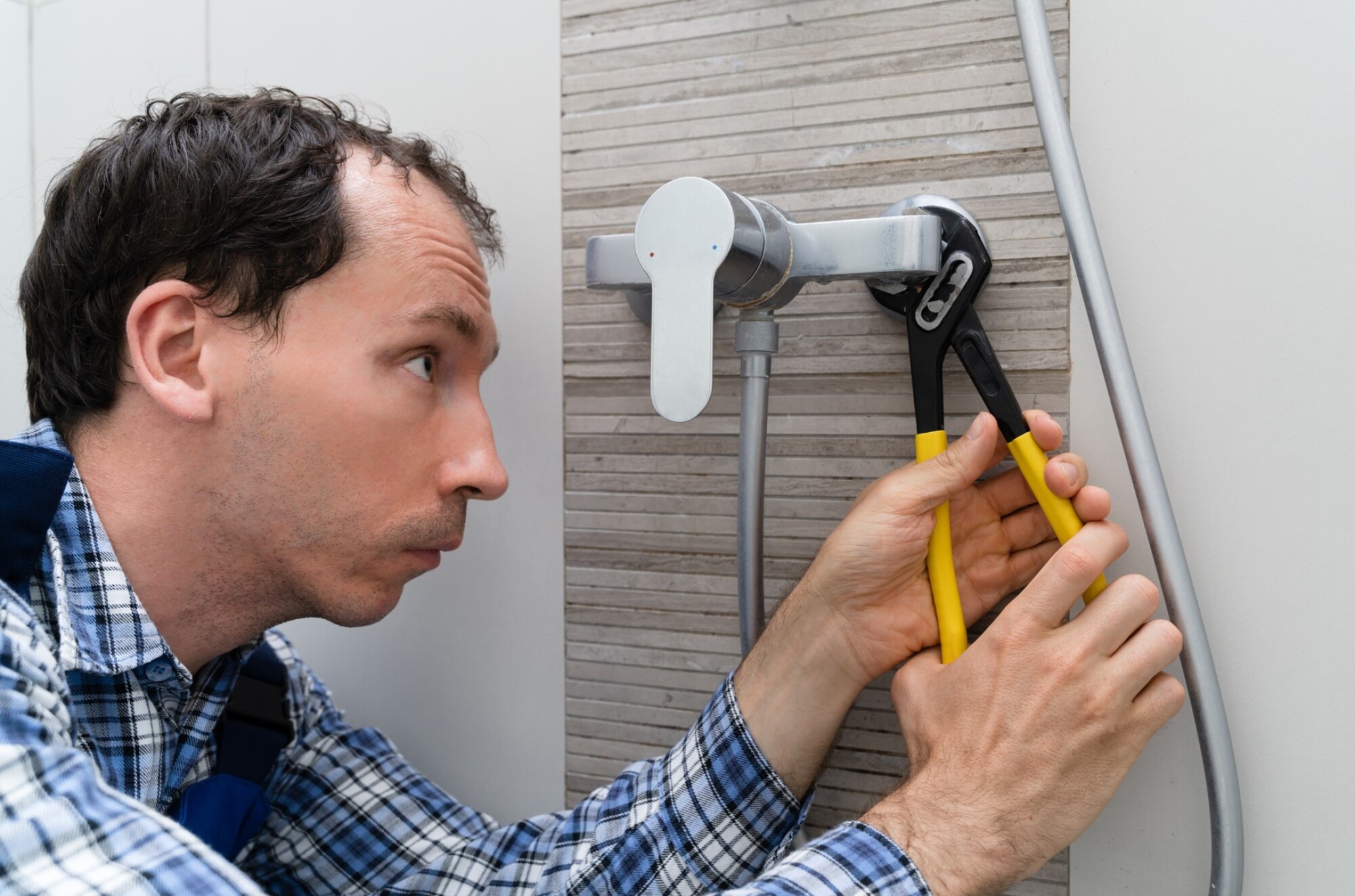 Pose de mitigeurs mécaniques