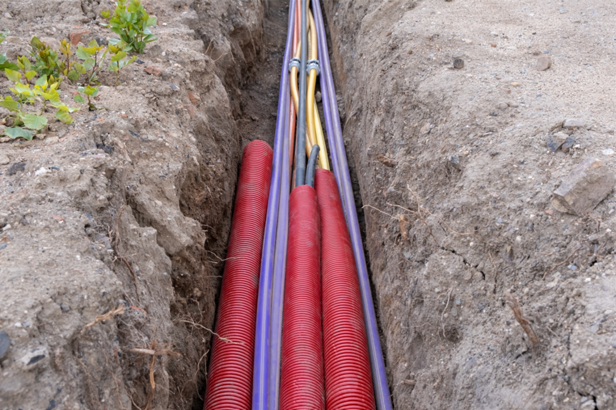 Installation de gaine pour câbles enterrés