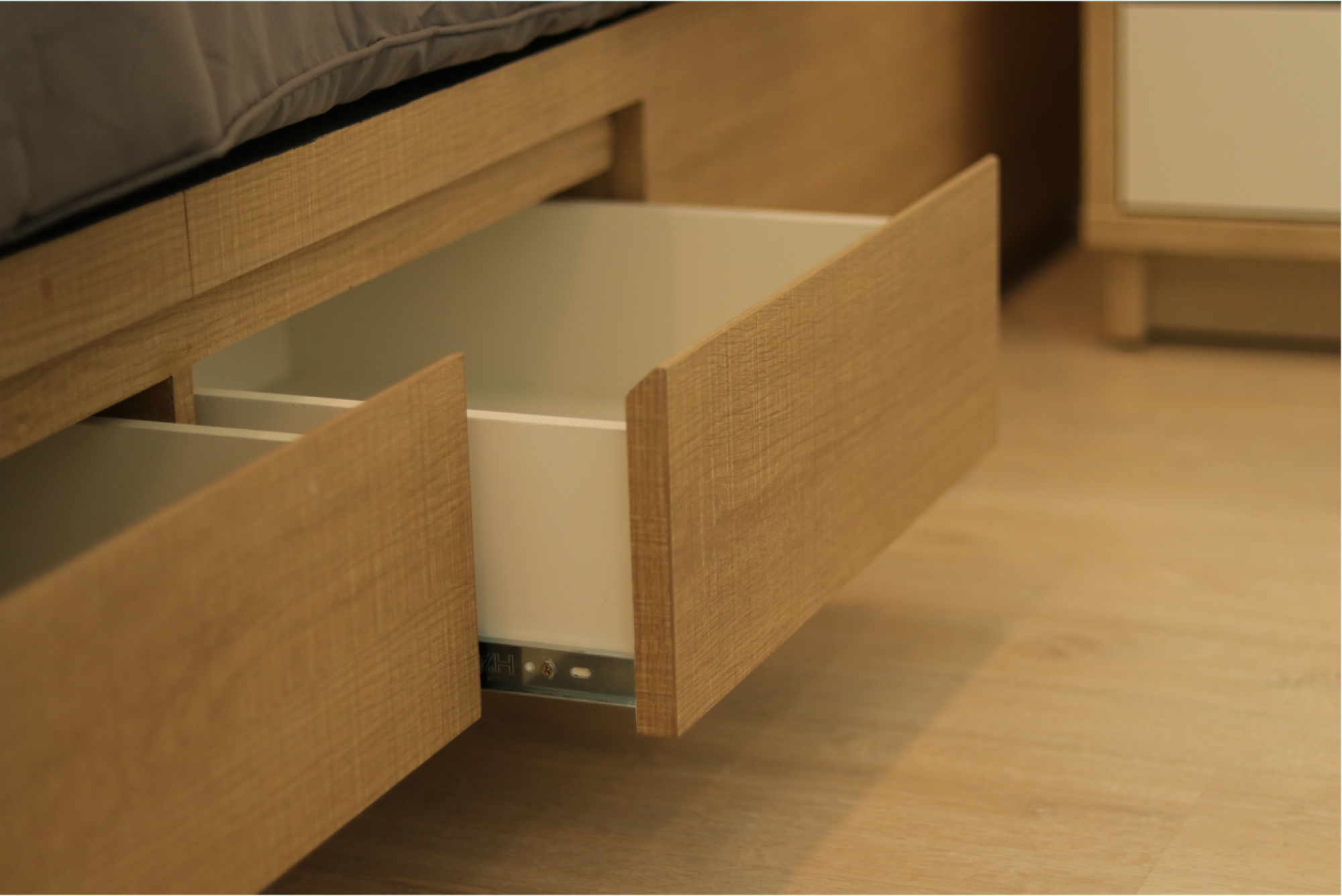 Création d'espace de rangement sous lit